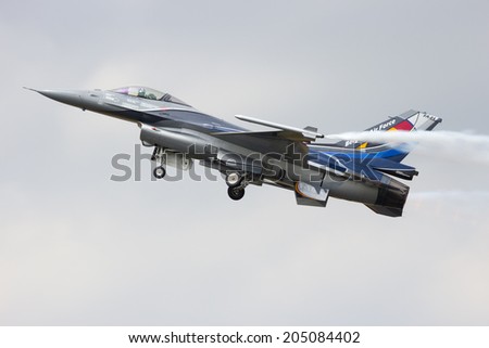 GILZE-RIJEN, THE NETHERLANDS - JUNE 20: Belgian Air Force F-16 solo display performing at the Dutch Air Force Open Day on June 20, 2014 in Gilze Rijen, The Netherlands