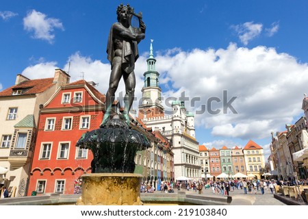 POZNAN, POLAND - AUGUST 20: The colorful main square and town hall in Poznan on August 20, 2014 in Poznan, Poland. The city is the 4th largest and the 3rd most visited city in Poland.