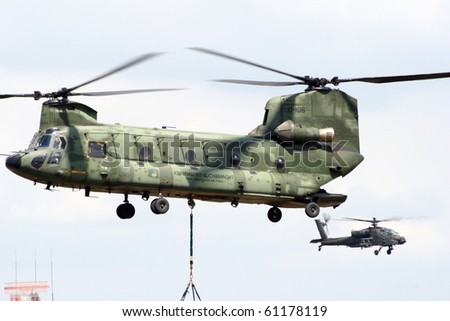 VOLKEL, NETHERLANDS - JUNE 16: Dutch Air Force CH-47 Chinook and AH-64 Apache during the Air Power Demo at Royal Netherlands Air Force Days June 16, 2007 in Volkel, Netherlands.