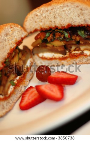 Vegan sandwich made with marinated eggplant, zucchini and tofu \