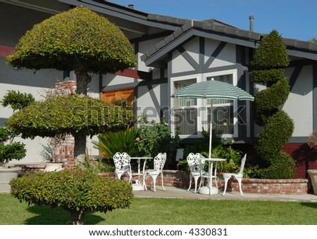 Elegant front yard with decorative shrubs and bushes