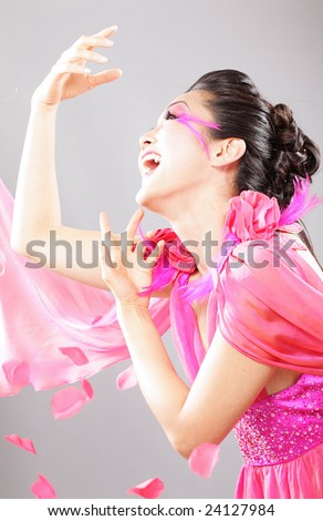 Laughing model in pink