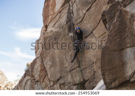 Woman rock climbs in Mexico