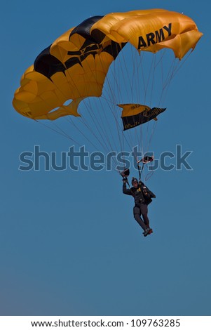 HILLSBORO, OR - AUG 5: A member of the US Army Golden Knights Parachute Team performs at the Oregon Air Show at Hillsboro Airport on August 5, 2012 in Hillsboro, OR.