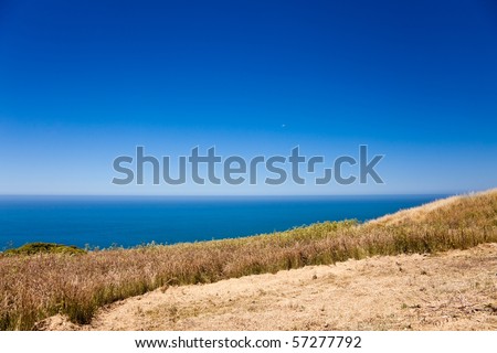 Ocean coastline landscape. Ocean coastline landscape with crescent moon on a background.