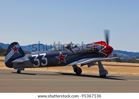SANTA ROSA, CA - AUG 21: Pilot Will Whiteside taxi on his Yakovlev model 3U, or a YAK3U/R2000 during the Wings Over Wine Country Air Show, on August 21, 2011, Sonoma County Airport, Santa Rosa, CA.