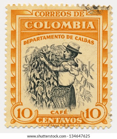 COLOMBIA - CIRCA 1956: A stamp printed in Colombia, shows Coffee picker, Caldas, circa 1956
