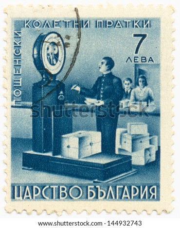 BULGARIA- CIRCA 1941: A stamp printed in Bulgaria shows Weighing Packages, circa 1941