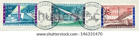 BELGIUM - CIRCA 1957: A stamp printed in Belgium, shows Civil Engineering Pavilion, Belgian Congo, Ruanda-Urundi Pavilion , Benelux Gate, circa 1957