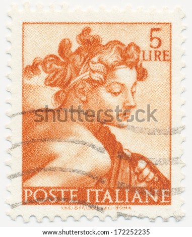 ITALY - CIRCA 1961: A stamp printed in Italy shows head boys, series Designs from Sistine Chapel by Michelangelo, circa 1961