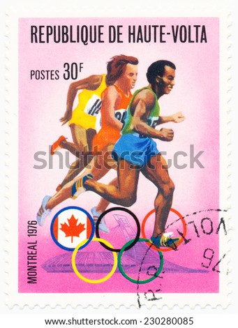 BURKINA FASO - CIRCA  1976: A stamp printed in Republic of Upper Volta, shows runners, series Olympic Games, Montreal, Canada, circa 1976
