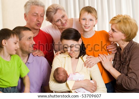portrait of a happy family of eight people