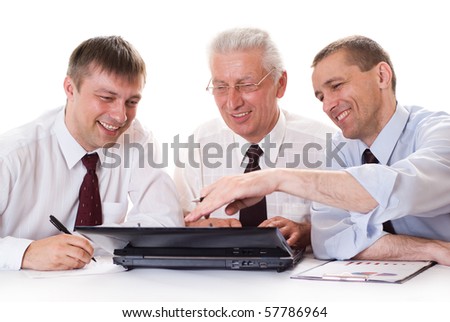 Three businessmen working on a white background