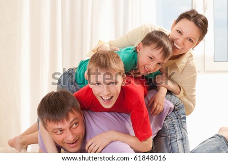 portrait of a happy family on the carpet