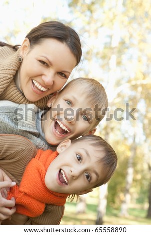 nice boys with mom on the nature