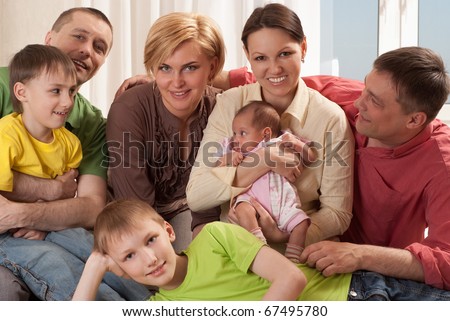 portrait of a happy family of seven people