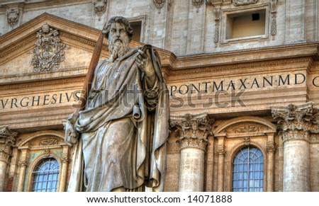 Statue of a saint in front of St-Peters Basilica. Pseudo HDR image created from a single HDR file.
