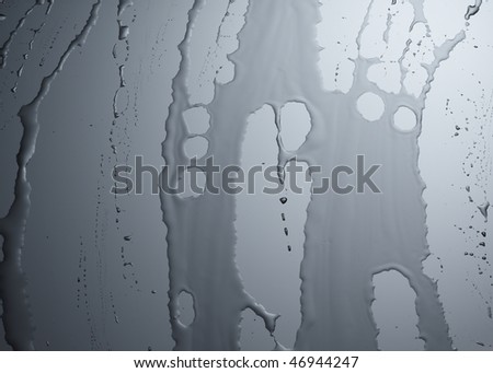 water stripes on a dark grey, glossy background