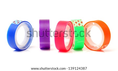 Tower of six rolls of coloured sticky tape.