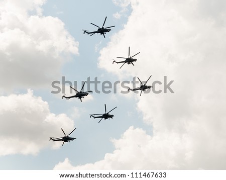 ZHUKOVSKY, MOSCOW REGION/RUSSIA - AUGUST 10: Aerobatic team Berkut on Mil Mi-28 (Havoc) attack helicopters. Airshow devoted to 100th anniversary of Russian Air Forces on August 10, 2012 in Zhukovsky.