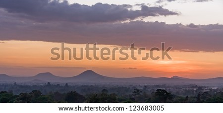 Bright evening glow over mountains. Arusha, Tanzania.