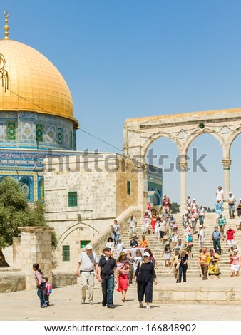 JERUSALEM - JULY 20: Numerous tourists walk down on stairs from Dome of the Rock Mosque on Temple Mount on July 20, 2008 in Jerusalem.