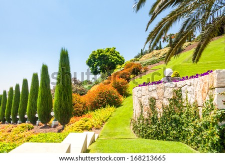 HAIFA, ISRAEL - JULY 17: View on beautiful Bahai garden terraces  with blossoming flowers on July 17, 2008 in Haifa.