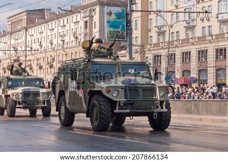 MOSCOW/RUSSIA - MAY 9: Tigr (tiger) high-mobility armoured vehicle GAZ-2330 motorcade moves on display during parade festivities devoted to 65th anniversary of Victory Day on May 9, 2010 in Moscow.