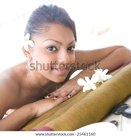 A woman relaxing and enjoying a day at spa