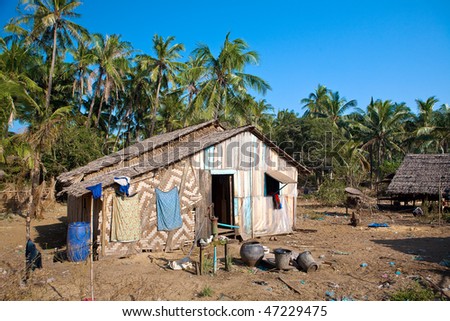 Traditional rural house made out of natural material on the poorer west coast of Ngwe Saung, Myanmar.