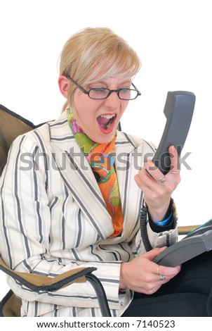 Attractive angry dissatisfied,  trendy young blond businesswoman making a phone call,  white background,