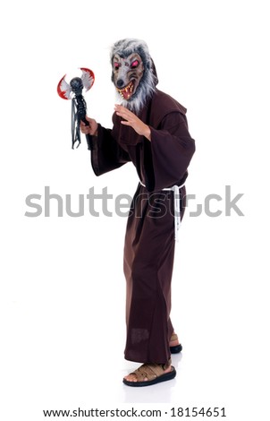 Holiday Halloween scene, creepy character priest in habit with sword.  Studio, white background.