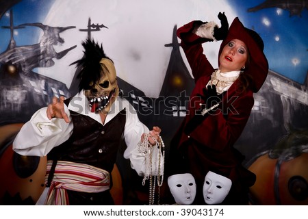 Young woman, Halloween lady with fancy hat and skeleton character. Studio, painted themed background.