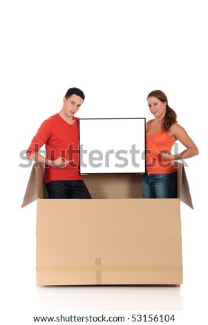 Young couple friends in chat box, cardboard box representing chat room holding advertising board.  Studio, white background