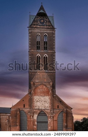 Similar – Image, Stock Photo Marienkirche in Wismar in the sunset.