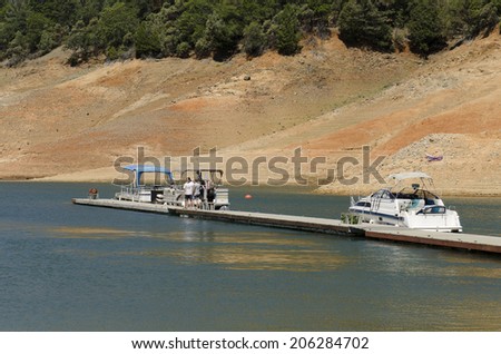 SHASTA LAKE, CA, USA - JUNE 17, 2014: Shasta Lake shows the water drought crisis occurring in California with very low water levels