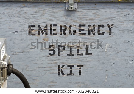 Emergency fuel spill kit at a ocean commercial fishing pier fuel fill station