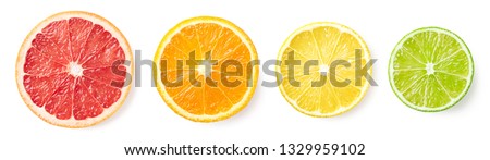 Similar – Image, Stock Photo citrus fruits cut into round pieces: orange, grapefruit, lemon, tangerine