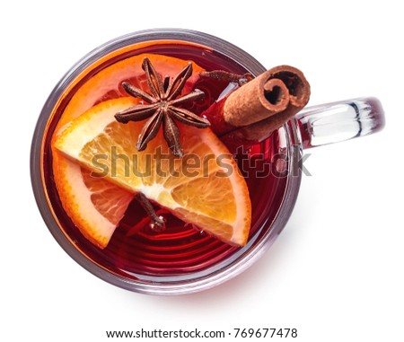 Glass of hot mulled wine with spices isolated on white background. Top view Сток-фото © 