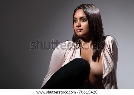 Sexy fashion model head turned away in sultry pose
