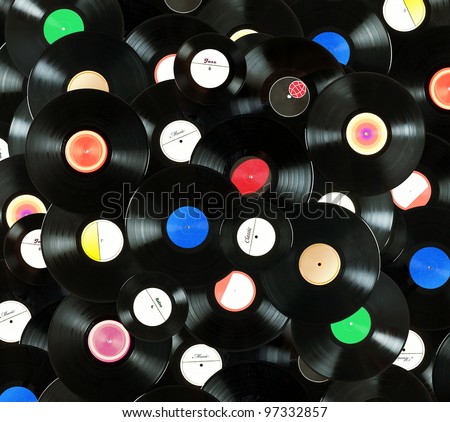 Abstract music colorful background made of vintage vinyl records, isolated over white background, all labels designed by myself