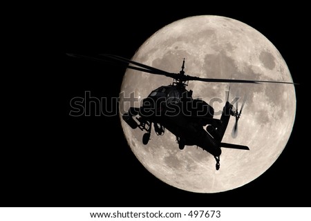 Apache helicopter silhouetted by a full moon
