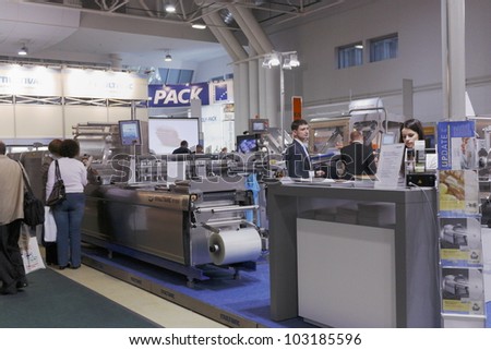 MOSCOW- OCTOBER 12:The machine is a German company MULTIVAC for packaging products in a vacuum or gas environment at the international exhibitionAGROPRODMASH `2011 on October 12, 2011 in Moscow