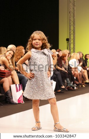 MOSCOW-SEPTEMBER 5:Unidentified models show bio-dynamic children\'s shoes from sustainable materials Spanish brand at the international Lea Lelo Fashion Fair on September 5, 2011 in Moscow