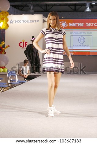 MOSCOW - SEPTEMBER 29:Unidentified models show children\'s clothing brand of Italian SILVIAN HEACH Collection Premiere Moscow children at the International Fashion on September 29, 2011 in Moscow