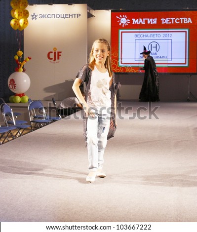 MOSCOW - SEPTEMBER 29:Unidentified models show children's clothing brand of Italian SILVIAN HEACH Collection Premiere Moscow children at the International Fashion on September 29, 2011 in Moscow