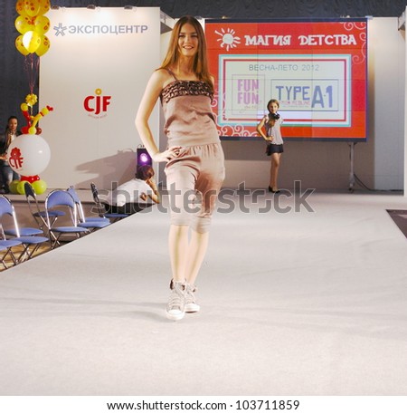 MOSCOW - SEPTEMBER 29:Unidentified models show children\'s clothing brand of Italian FUN&FUN girl Collection Premiere Moscow children at the International Fashion on September 29, 2011 in Moscow, Russia.