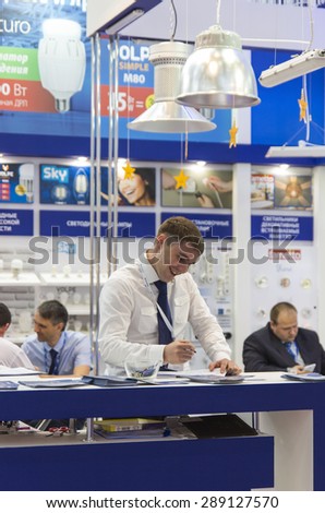 MOSCOW-JUNE 10, 2015: Booth of electrical luminaires brand Uniel at the International Trade Fair ELEKTRO