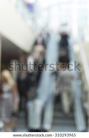 Trade show people, intentionally blurred image