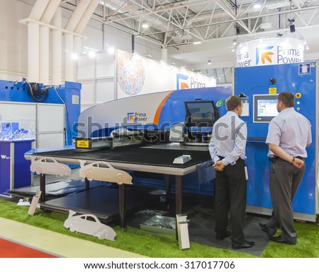 MOSCOW-MAY 30, 2013: Booth of equipment for metal processing of the Italian company Prima Industrie Group at the International Trade Fair METALLOOBRABOTKA